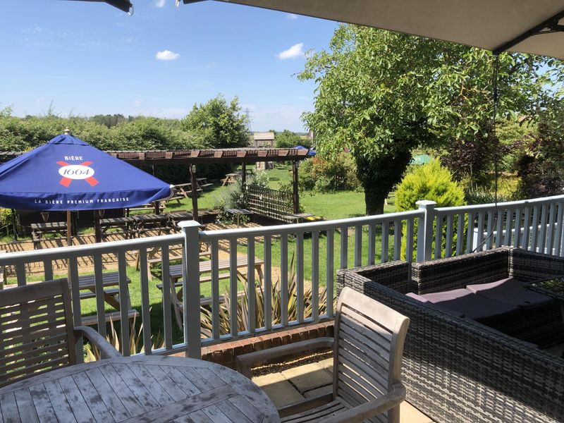 Rear patio and garden. June 2026. (Garden). Published on 22-06-2026 