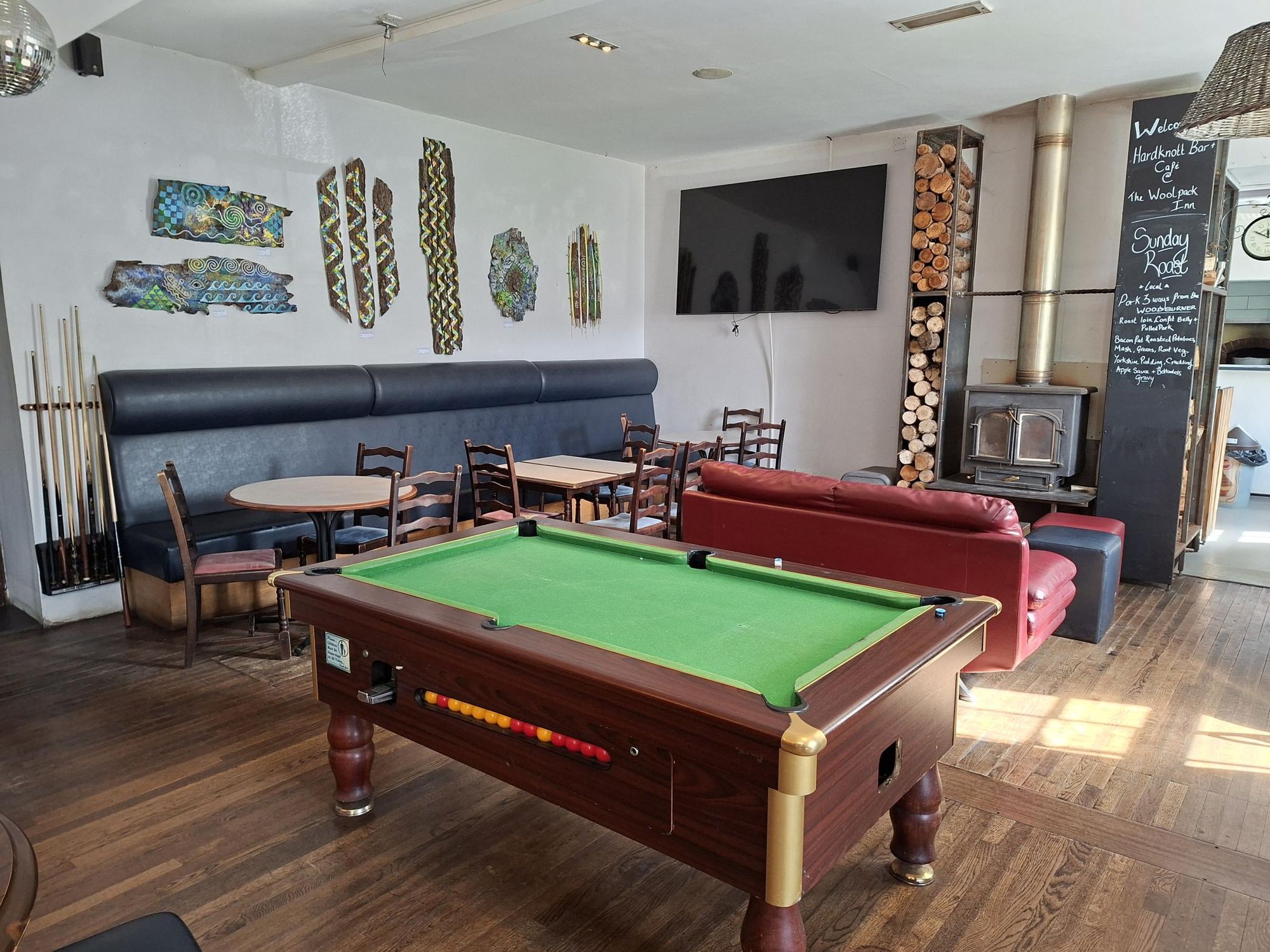 Pool table with seating and logburner (11/04/26 Adrian Smith). (Pub, Bar). Published on 03-06-2026