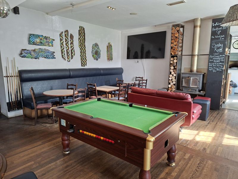 Pool table with seating and logburner (11/04/26 Adrian Smith). (Pub, Bar). Published on 03-06-2026 