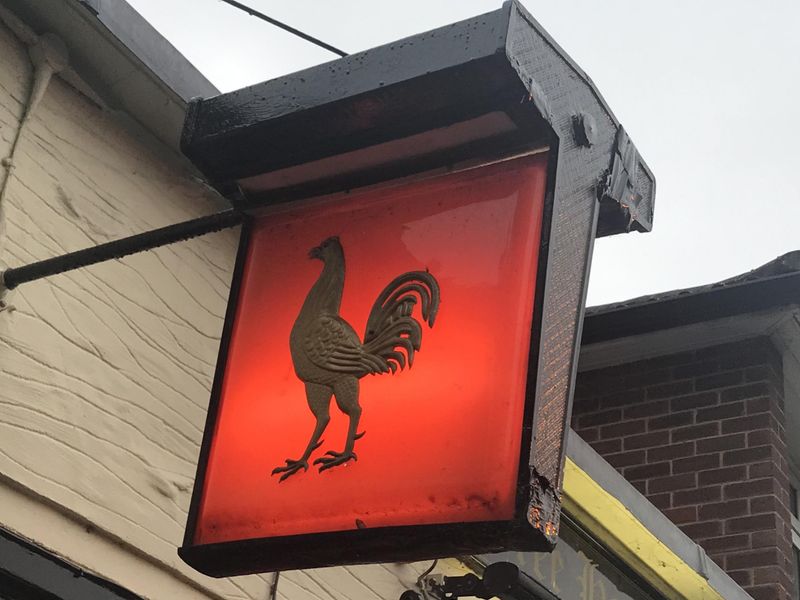 Weather-beaten Courage standard. (Pub, External, Sign). Published on 26-07-2025 