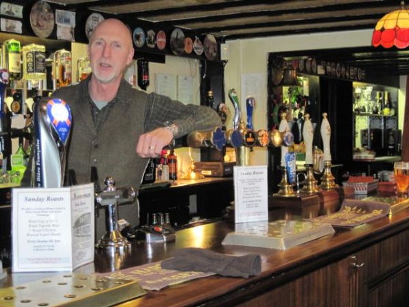 Landlord at bar. (Pub, Bar). Published on 11-02-2013