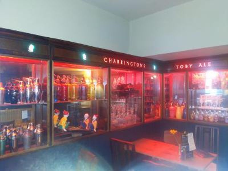 Illuminated Charrington's bar back. (Pub). Published on 03-03-2022
