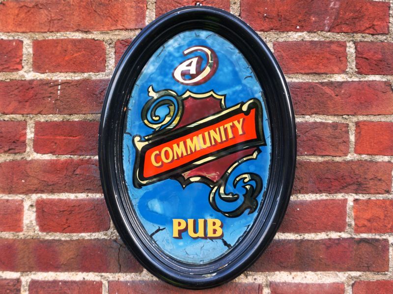 Photo taken 25 Oct 2021, "A Community Pub" sign.. (Pub, Sign). Published on 10-12-2023 