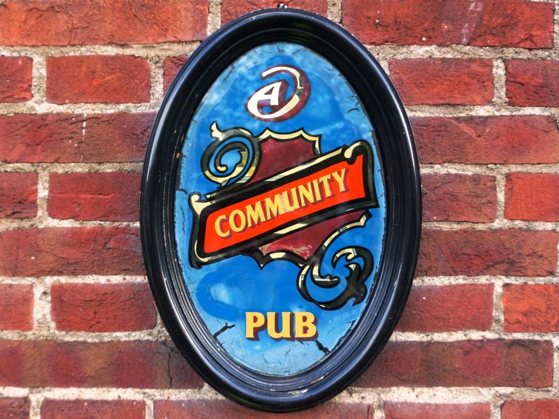 Photo taken 25 Oct 2021, "A Community Pub" sign.. (Pub, Sign). Published on 10-12-2023