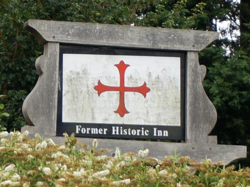 This sign alludes to the pub's original name, the Red Cross. (Sign). Published on 04-10-2015
