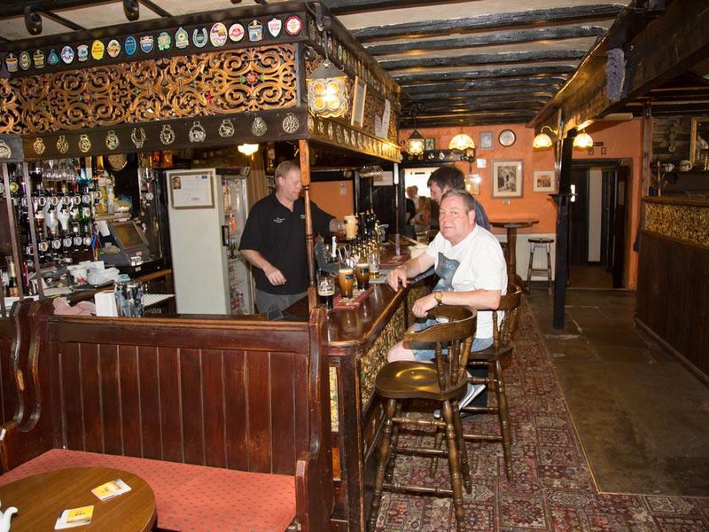 Bar at Hare & Hounds. (Pub, Bar, Publican, Customers). Published on 01-01-1970 