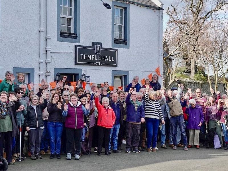 Villagers Celebrate Purchase of the Pub. (Pub, External). Published on 23-04-2025