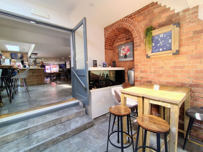 Stairs leading to rear seating area.. (Pub). Published on 16-08-2026