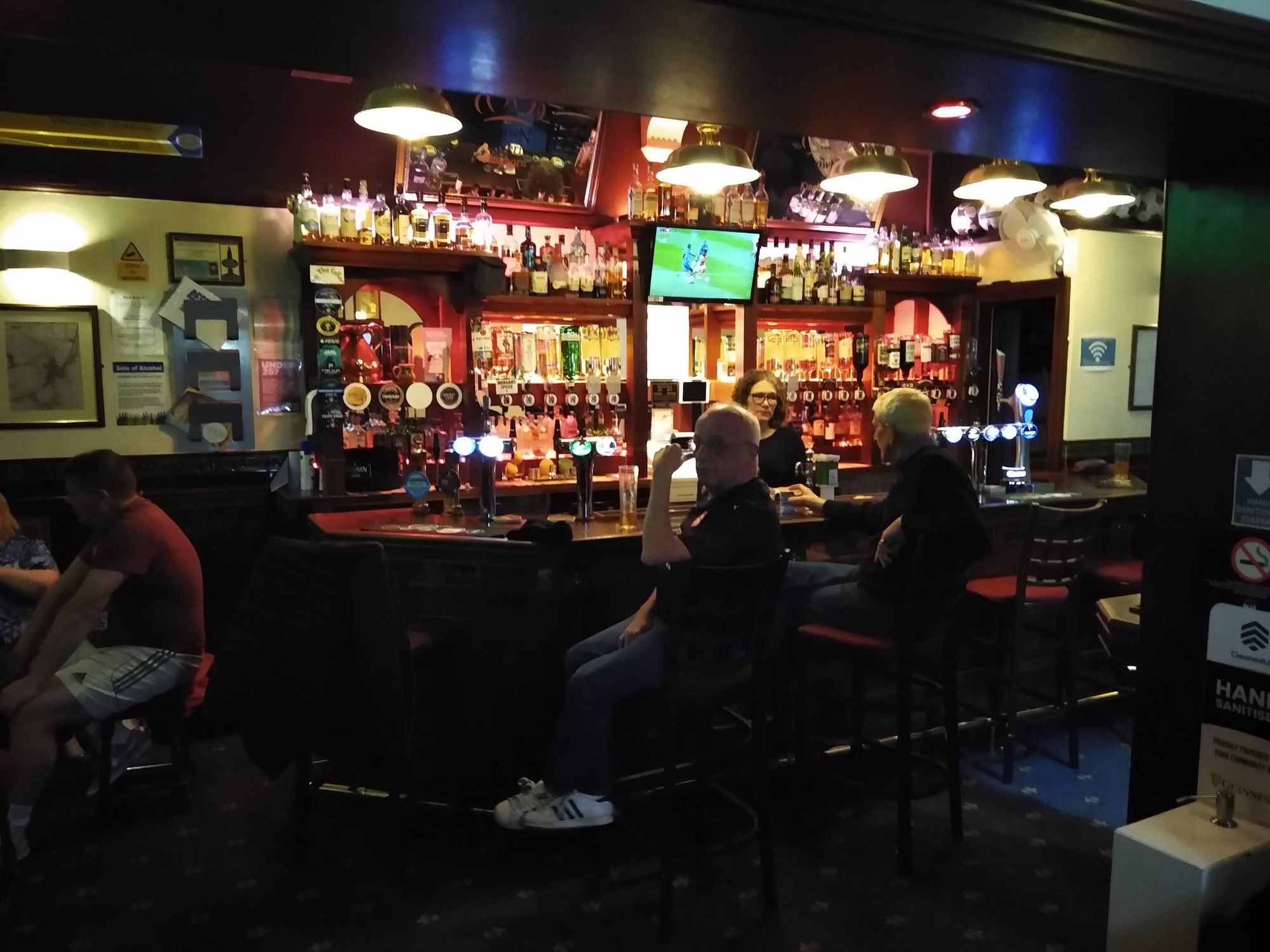 main bar area with customers. (Pub, Bar, Customers). Published on 21-04-2022
