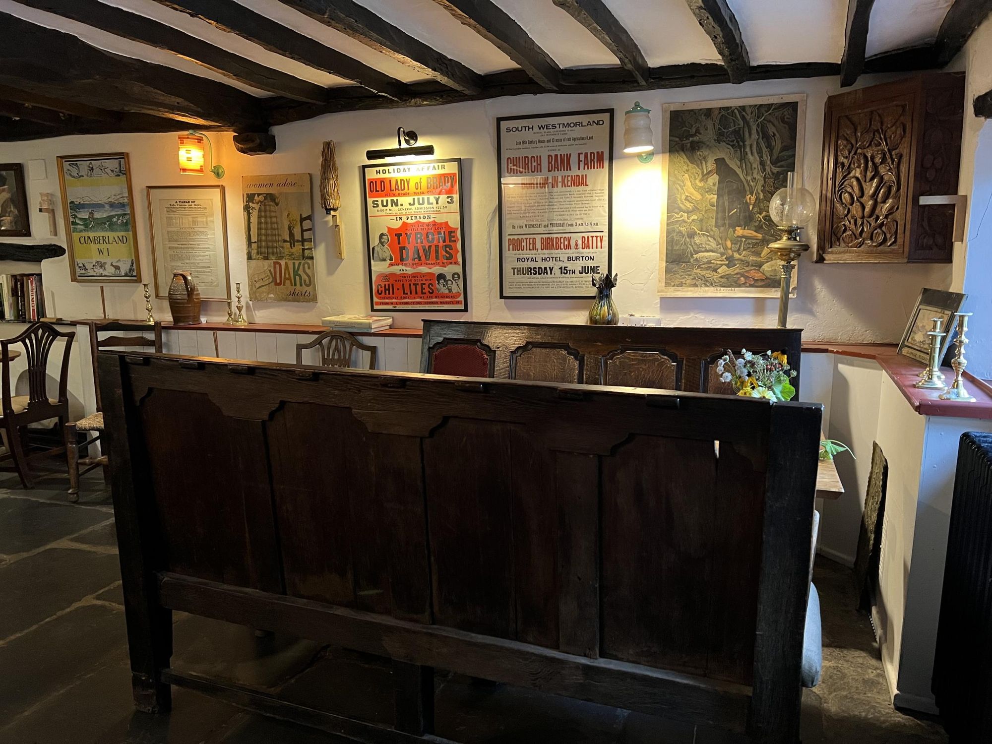 Antique settles and posters. (Pub, Bar). Published on 15-09-2025