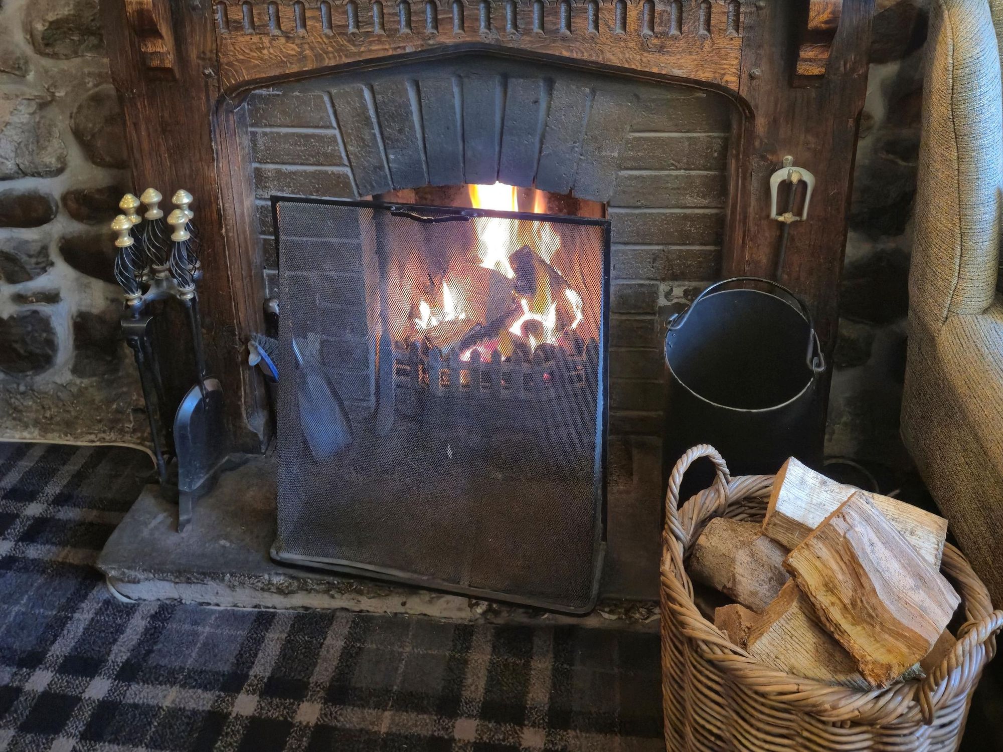 The fire with logs (15/11/2025 George Symes). (Pub, Bar). Published on 19-11-2025