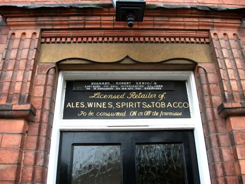 Ornate door licence sign writing in August 2012. (External). Published on 10-01-2015