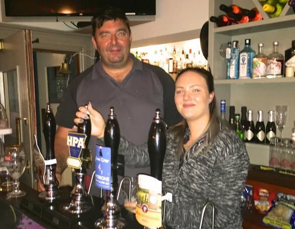Land Lord Mark Cook with bar staff member Demi Hyde in August 20. (Bar, Publican). Published on 19-08-2016
