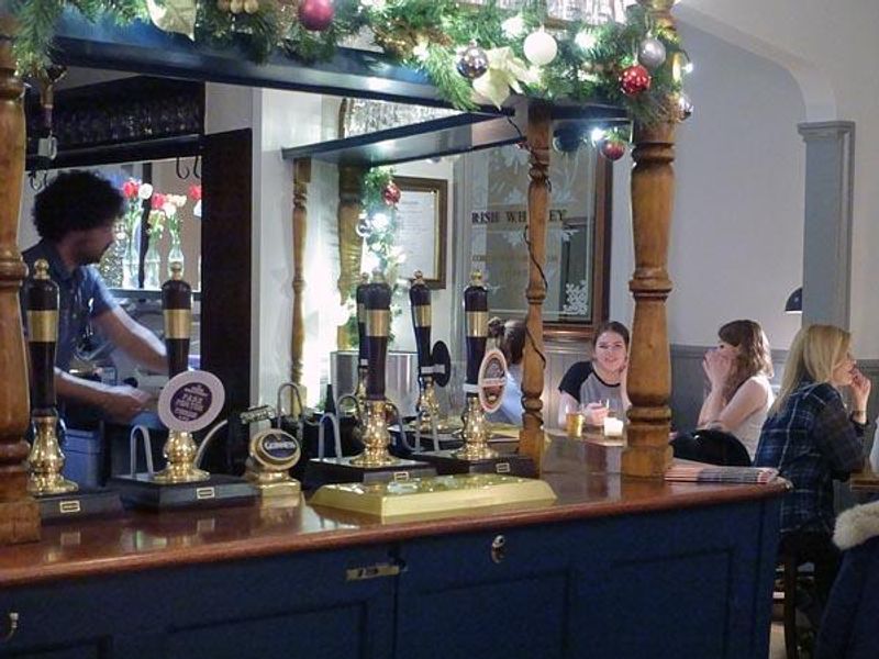 A busy night around the bar. (Pub, Bar, Customers). Published on 29-12-2015 