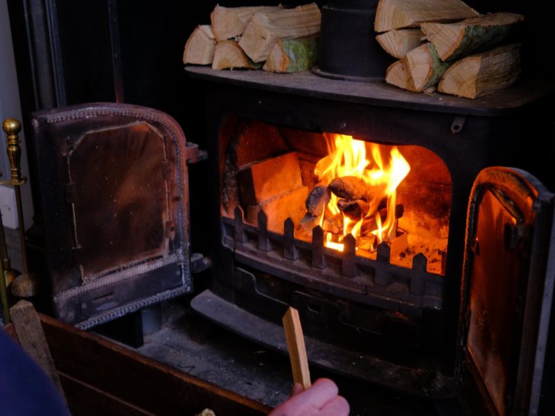 Re lighting the pub's log fire. (Pub). Published on 11-03-2022