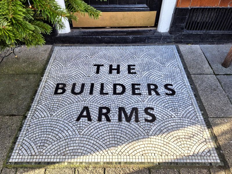 Floor mosaic at the side entrance. (Pub, External). Published on 24-12-2025 