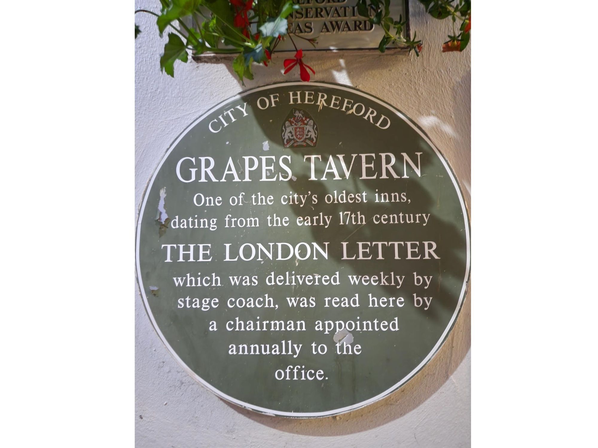 Plaque outside Grapes tavern. (External). Published on 06-06-2024