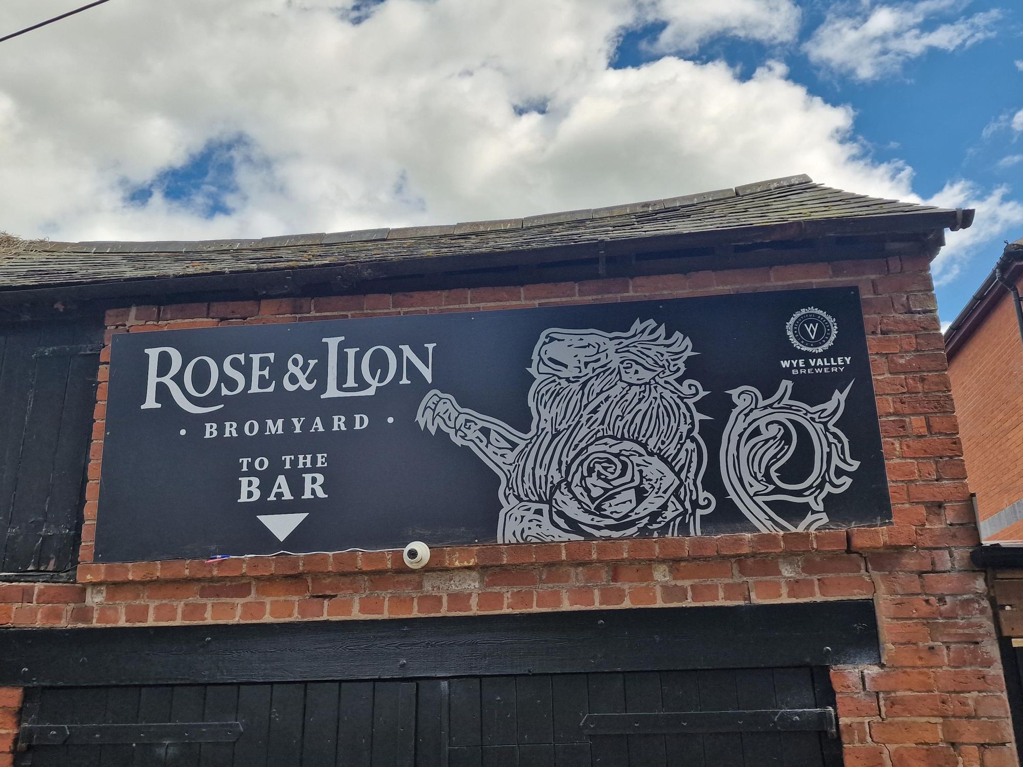 Pub sign in back yard. (External, Sign). Published on 25-06-2024
