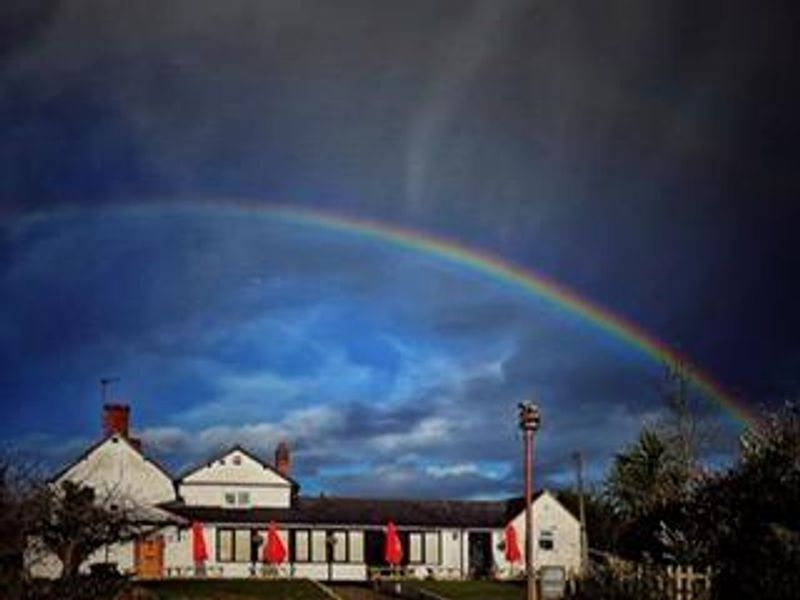 Rear of pub with rainbow. (External). Published on 09-05-2025 