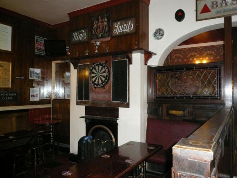 The back bar with fireplace & dart board. Published on 07-04-2014