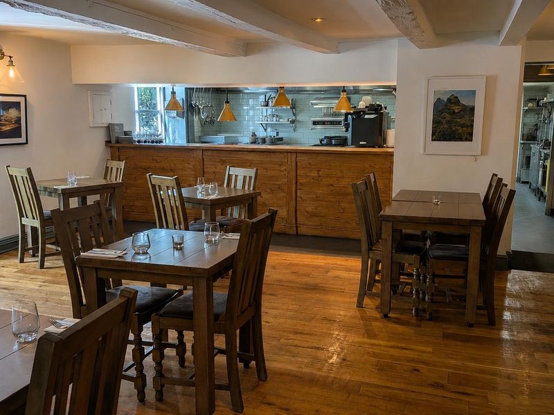 Seating area and open kitchen. (Pub). Published on 21-08-2026