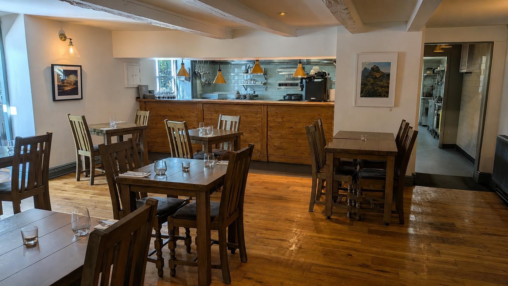 Seating area and open kitchen. (Pub). Published on 21-08-2026