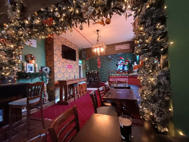 Right-hand seating area at Christmas. (Pub). Published on 07-12-2025 