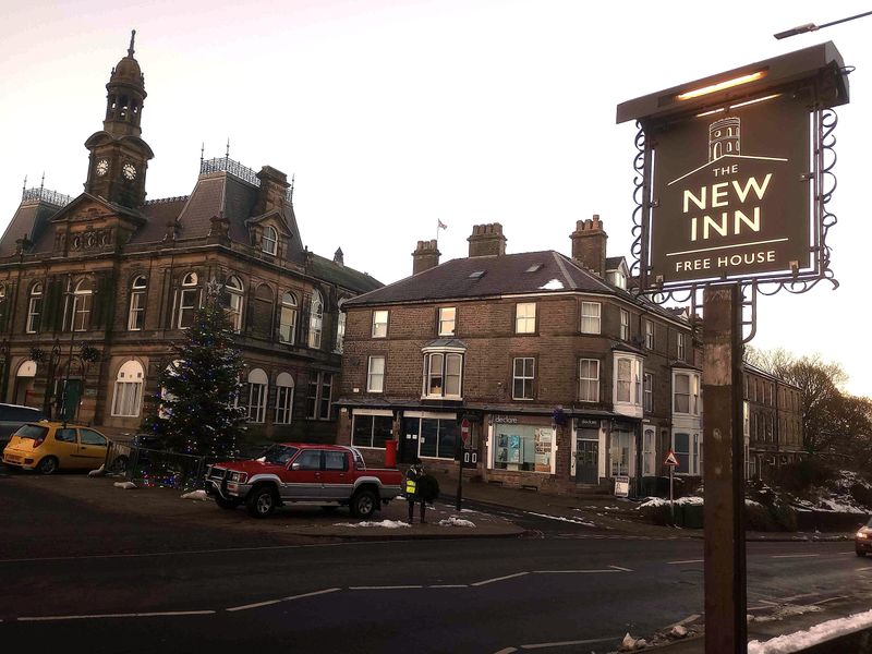 Pub sign with Market Place and Town Hall in the distance. (External, Sign). Published on 21-11-2024 