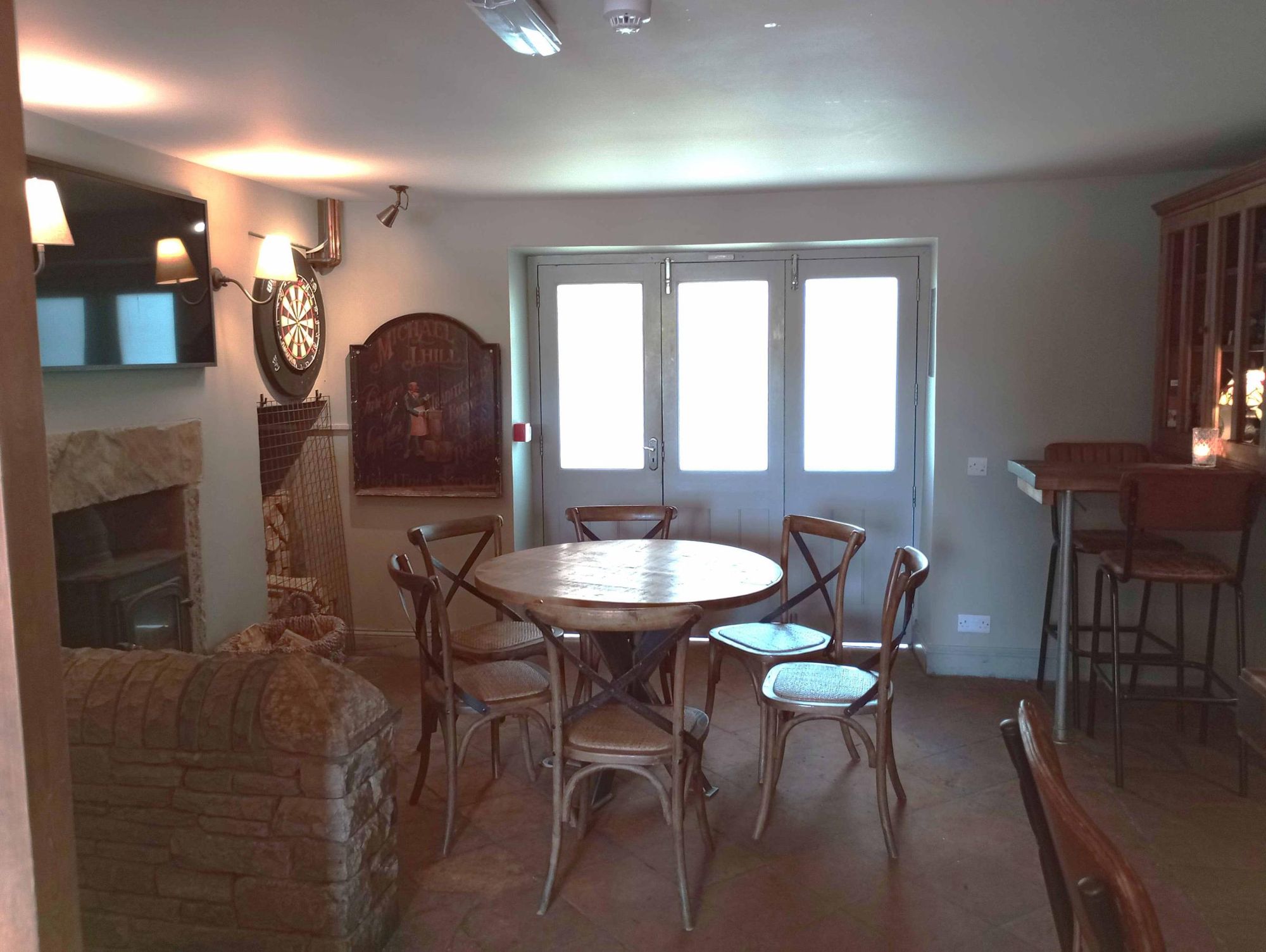 Seating area with dart board. (Pub). Published on 21-10-2025