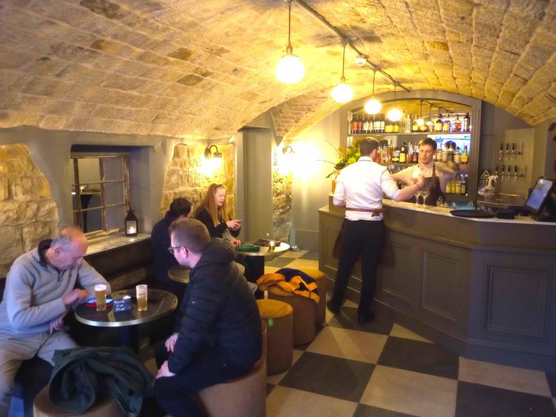 Bar and seating area. (Pub, Bar, Customers). Published on 15-03-2025