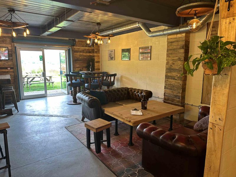 Seating area and exit to beer garden. (Pub). Published on 24-07-2024