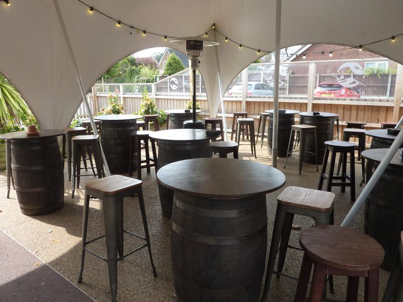 Covered outdoor seating April 2022 David Sherliker. (Pub, External, Garden). Published on 14-04-2022