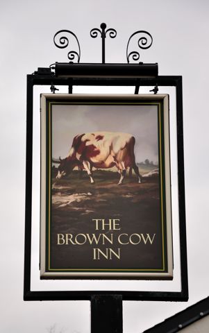 Pub sign Brown Cow Inn. (Pub, Sign). Published on 01-01-1970