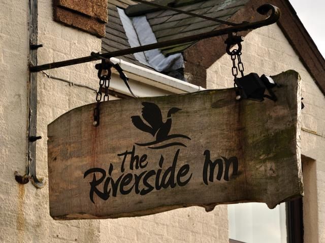 Pub sign Riverside Inn. (Pub, Sign). Published on 01-01-1970