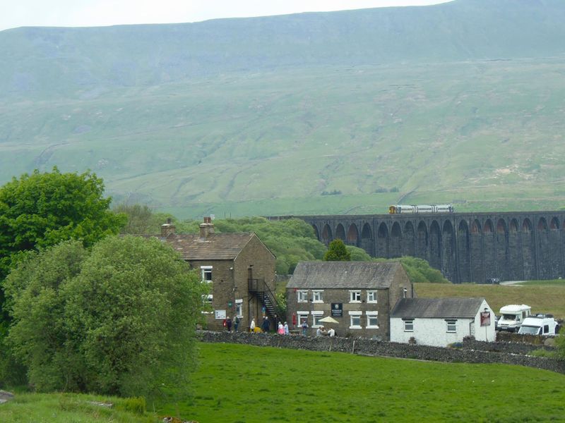 Whernside and Ribblehead Viaduct behind pub and Bunkhouse May 20. (External). Published on 05-03-2025