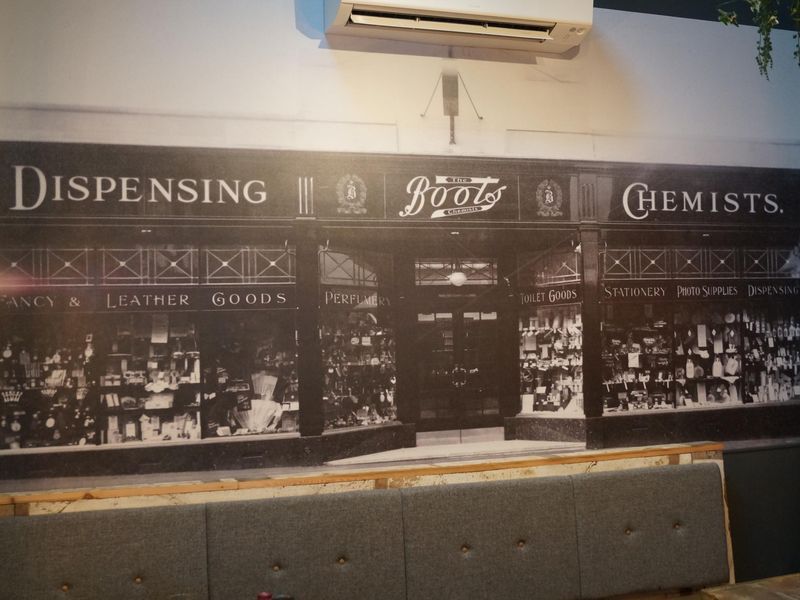 Mural in Garden Room is of building frontage when was Boots Chem. Published on 02-03-2022