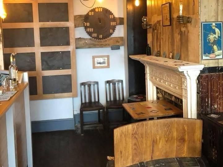 Interior seating and fireplace. (Pub, Bar). Published on 03-10-2023