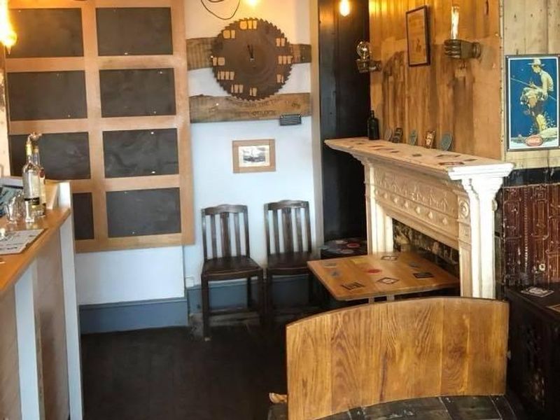 Interior seating and fireplace. (Pub, Bar). Published on 03-10-2023