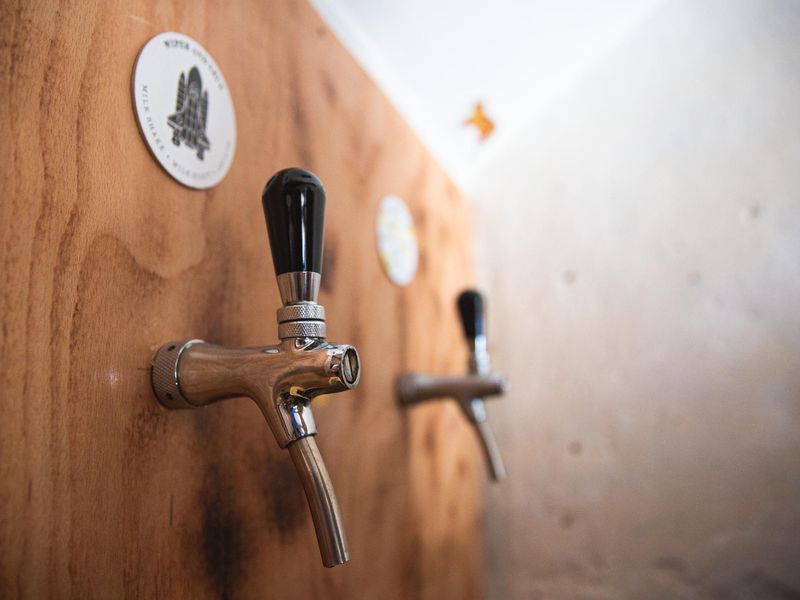 One of the keg taps on the wall (or two). (Bar). Published on 26-05-2022 