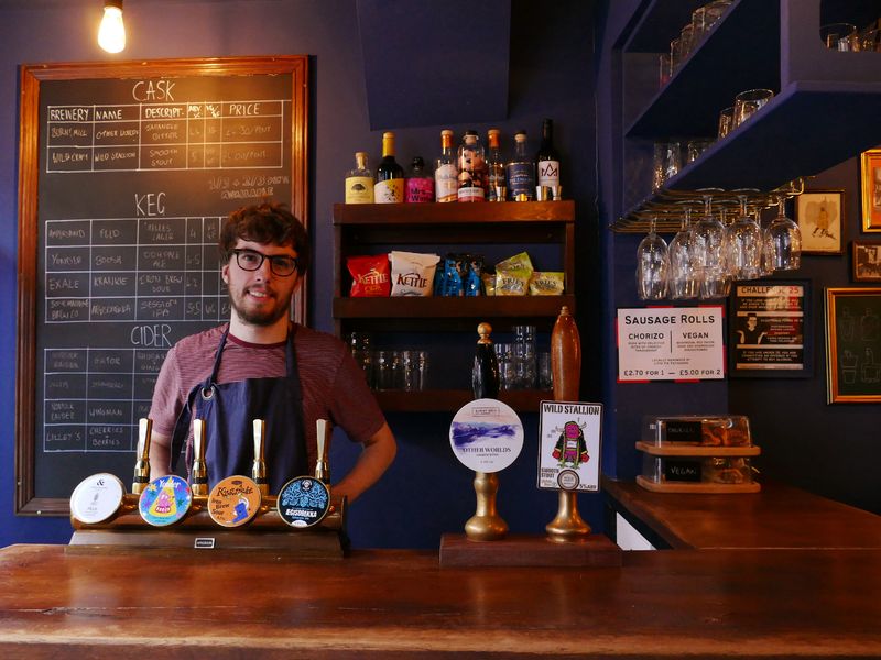 Co-owner Elliott at the bar. (Bar, Publican). Published on 01-04-2023