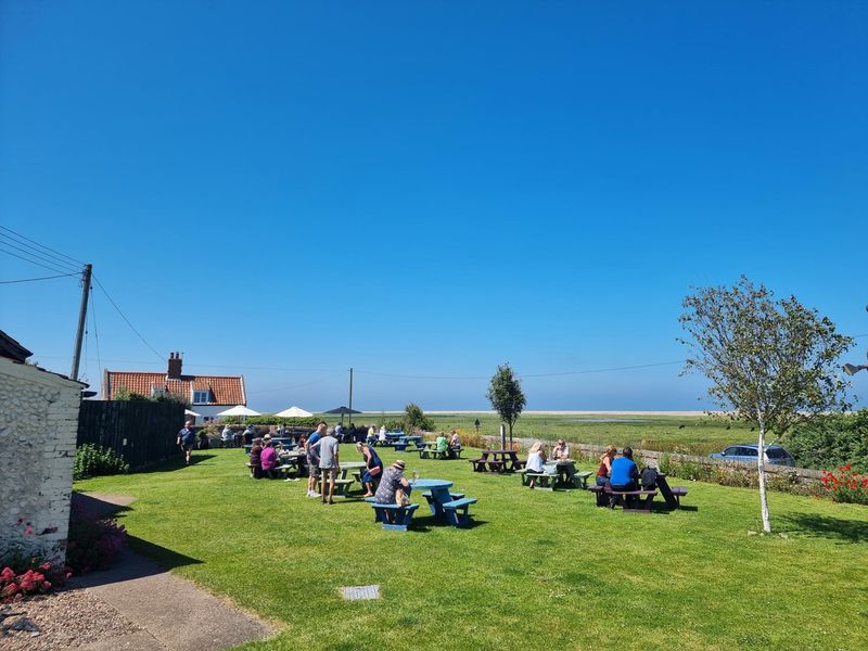 View across marshes to the sea. (Garden). Published on 01-06-2024