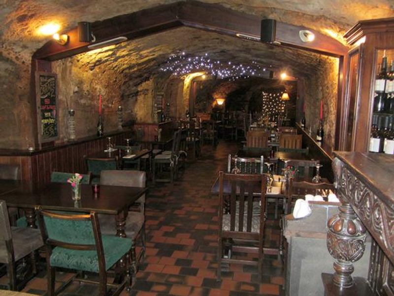 Restaurant/dining area in caves - rear downstairs. (Pub, Restaurant). Published on 25-03-2014 