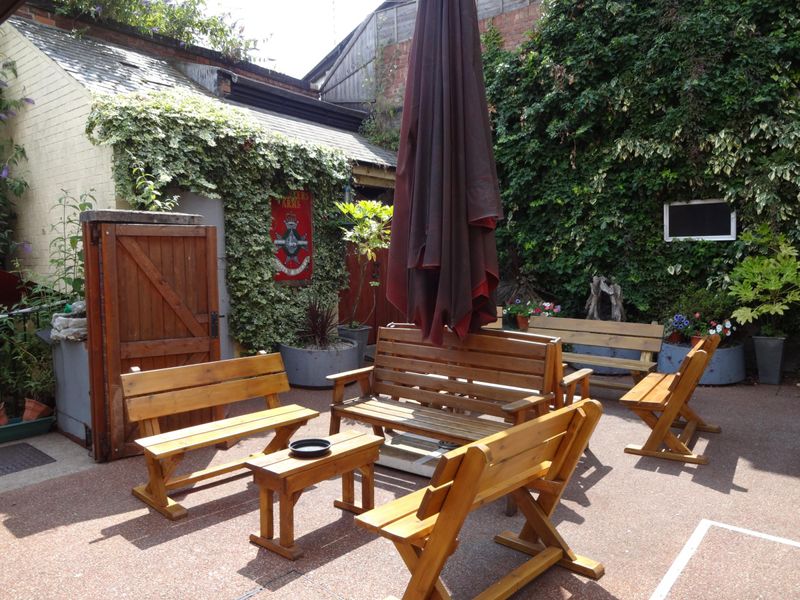 Patio area at bavck of pub July 2018. (Garden). Published on 18-07-2018