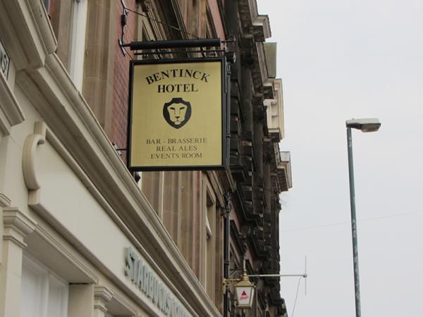 Pub sign with lighted Bass sign in background. (Pub, External, Sign). Published on 29-04-2014