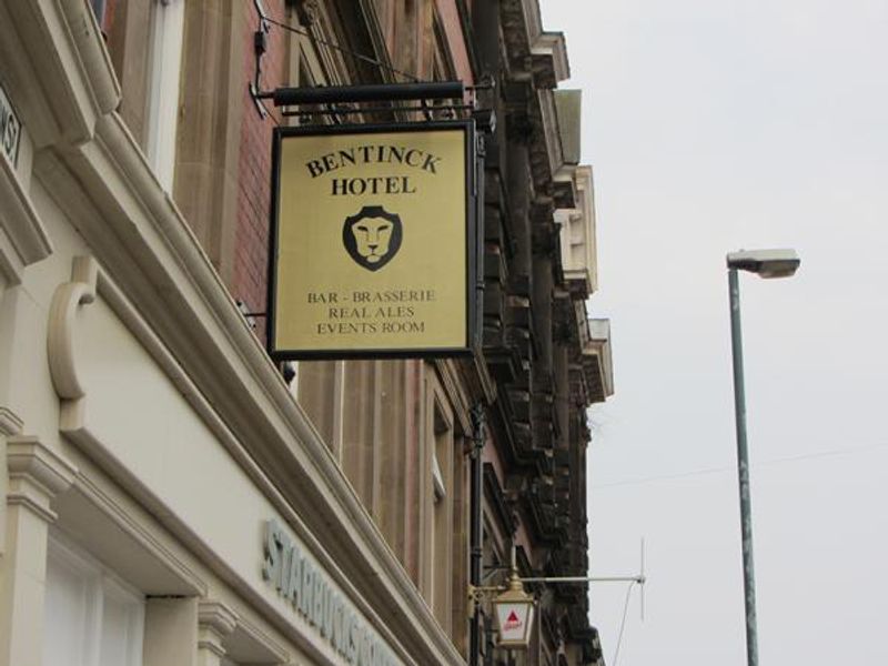 Pub sign with lighted Bass sign in background. (Pub, External, Sign). Published on 29-04-2014 
