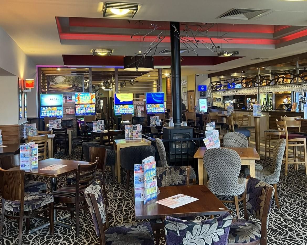 Seating area and fireplace. (Pub). Published on 30-03-2026