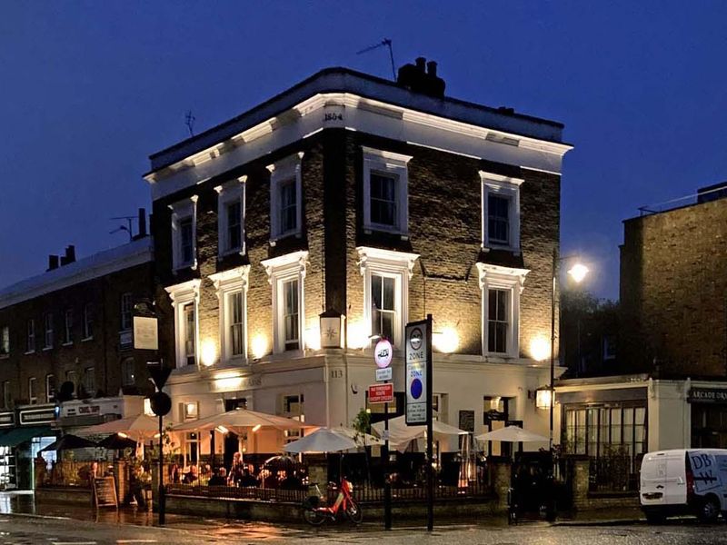 The pub at night sheltering pub goers from the rain. (Pub, External, Key). Published on 31-08-2025