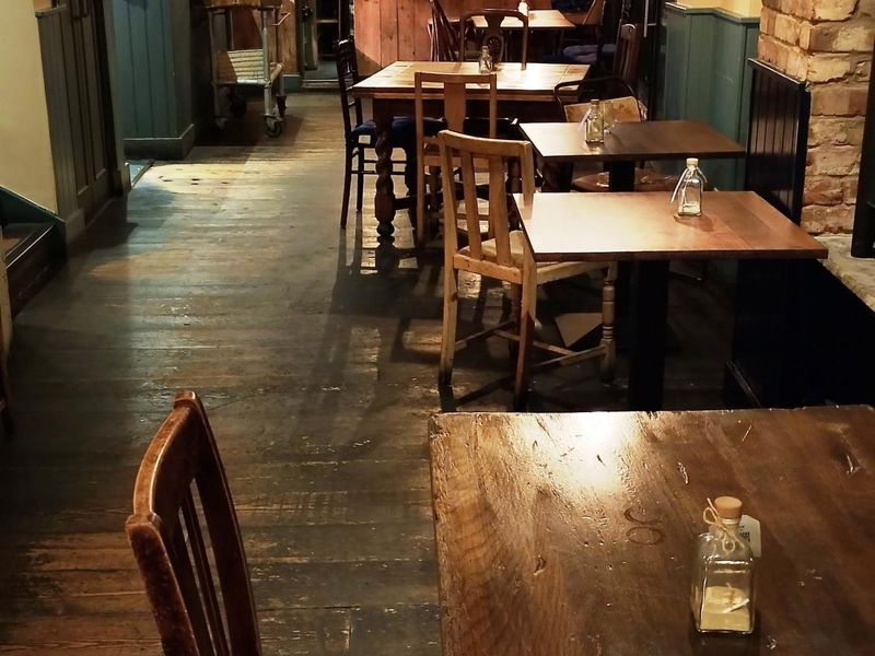 Downstairs area with open kitchen on left and bar straight ahead. (Pub). Published on 22-10-2025 