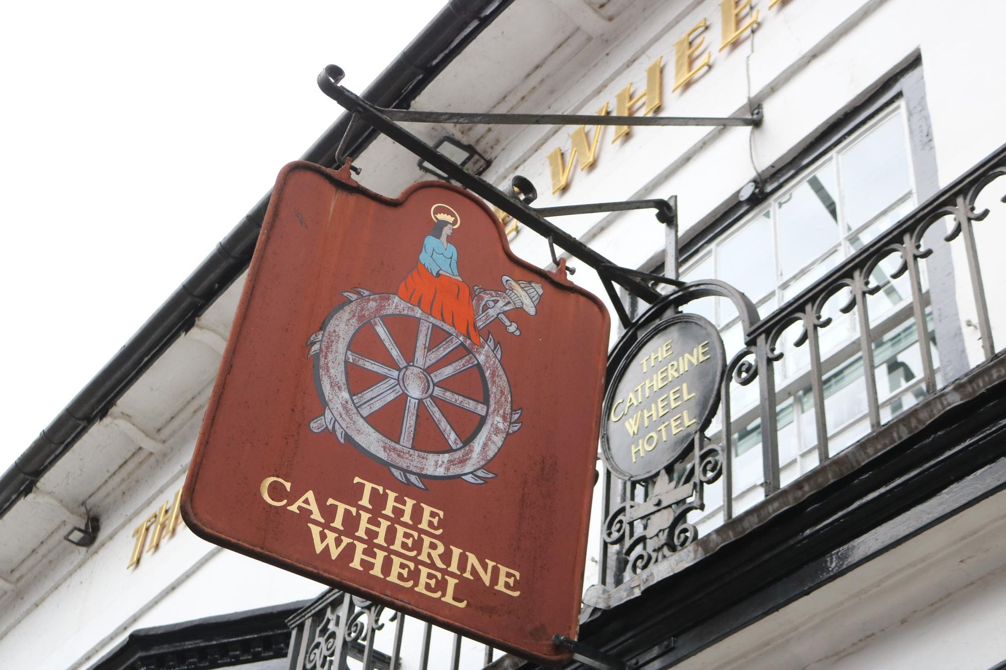 HoT-Catherine Wheel - pub sign over main entr looking W Feb 2026. (External, Sign). Published on 08-04-2026
