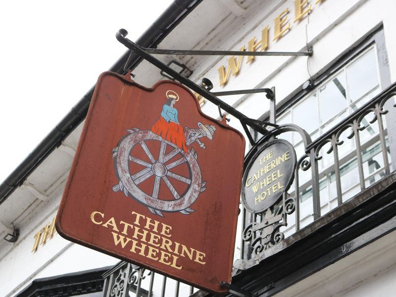 HoT-Catherine Wheel - pub sign over main entr looking W Feb 2026. (External, Sign). Published on 08-04-2026 
